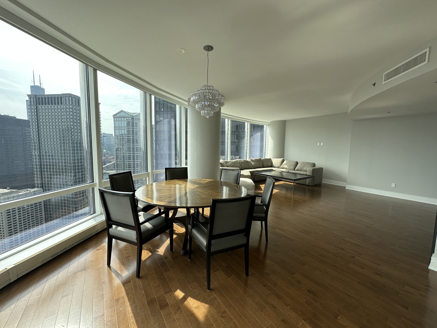 401 North Wabash Avenue, Unit 32H Chicago, IL 60611 - Photo 11 of 16 a view of a dining room with furniture window and outside view