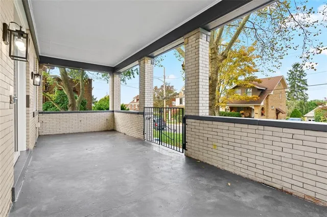 a view of roof with floor to ceiling window