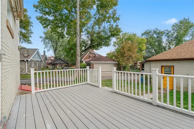 a view of a wooden roof deck