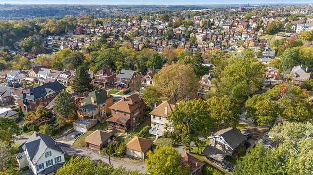 an aerial view of residential house with parking space