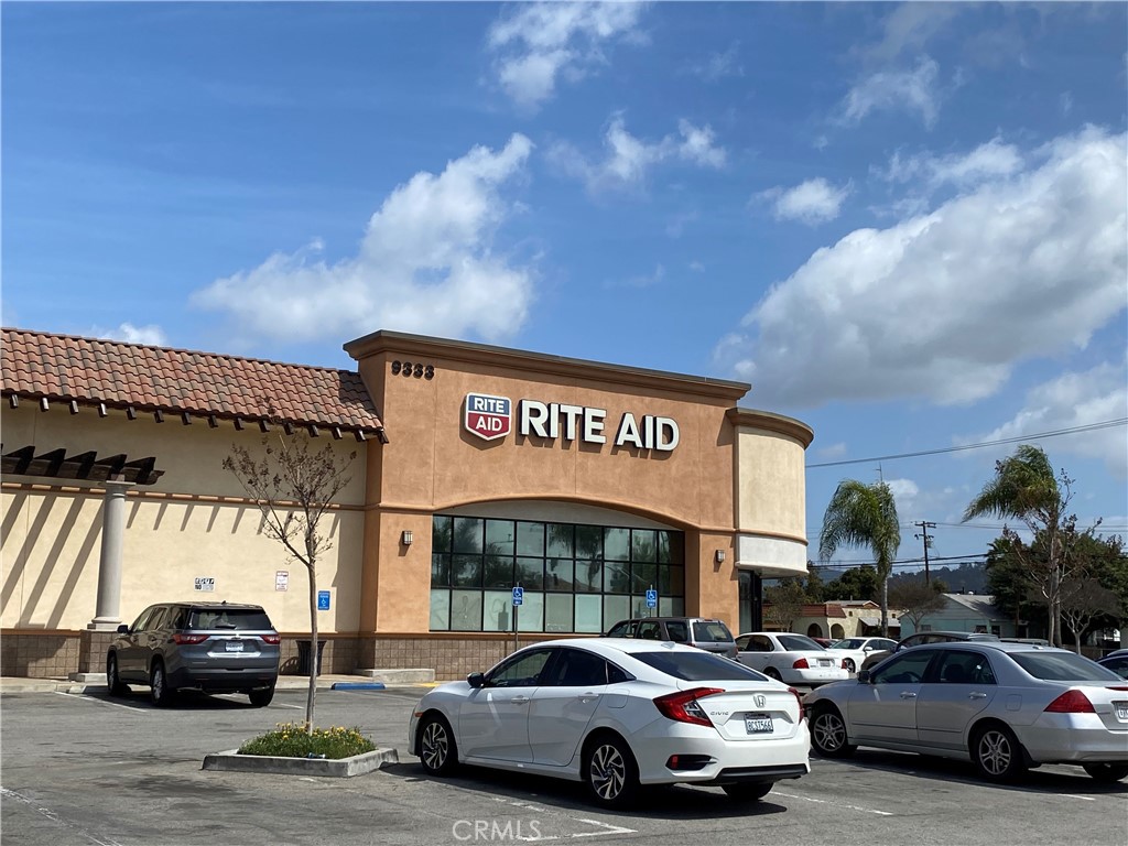 5103 Lindsey Avenue, Unit A Pico Rivera, CA 90660 - Photo 11 of 14 a view of cars parked in front of a building