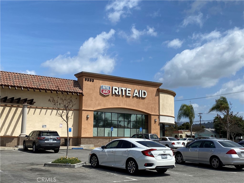 5103 Lindsey Avenue, Unit A Pico Rivera, CA 90660 - Photo 14 of 14 a view of cars parked in front of a building