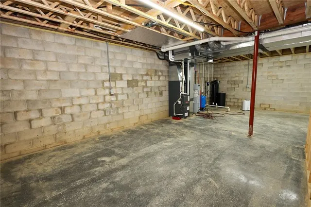 a view of a patio with table and chairs