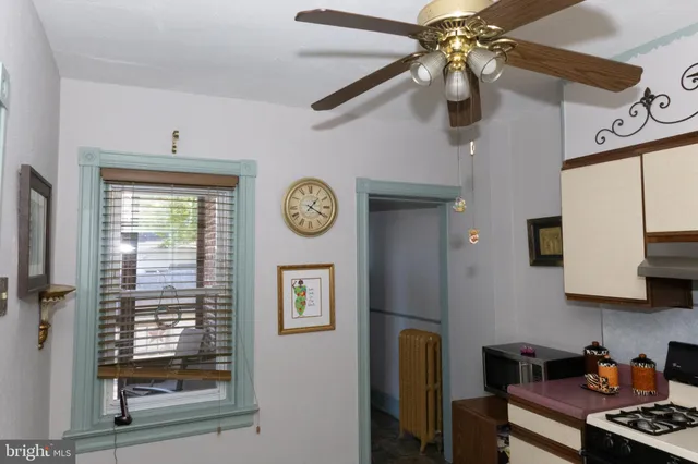 a view of a hallway with washer and dryer
