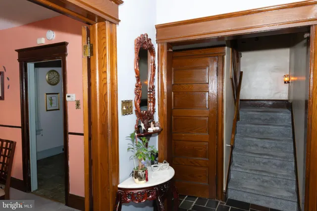 a bathroom with a shower and a mirror