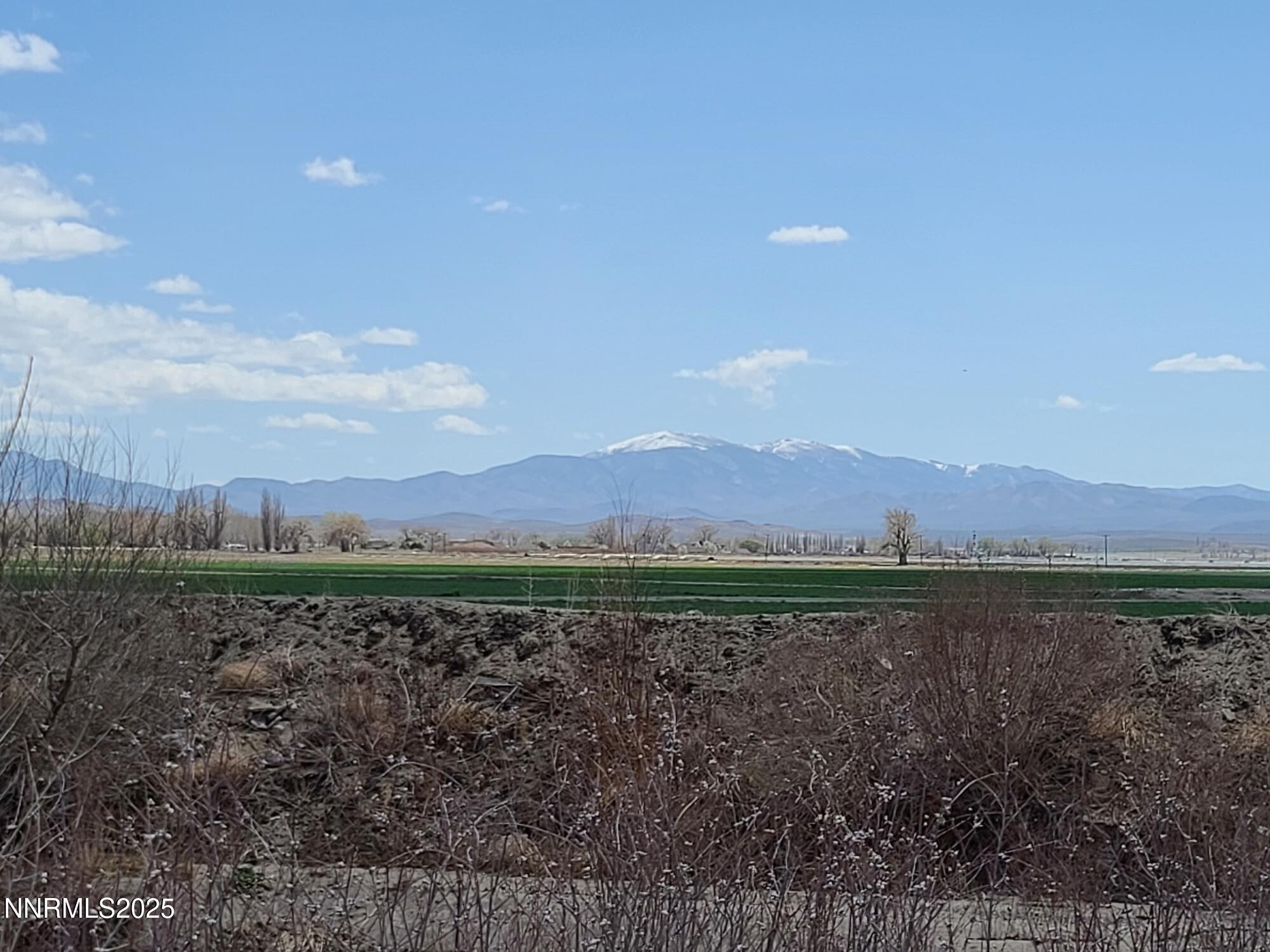 7 Margaroly Way Yerington, NV 89447 - Photo 5 of 9 a view of mountain with sunset in background