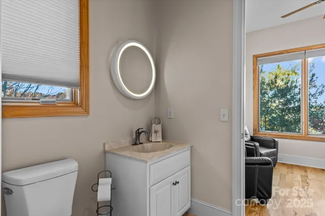 a bathroom with a bathtub and a sink
