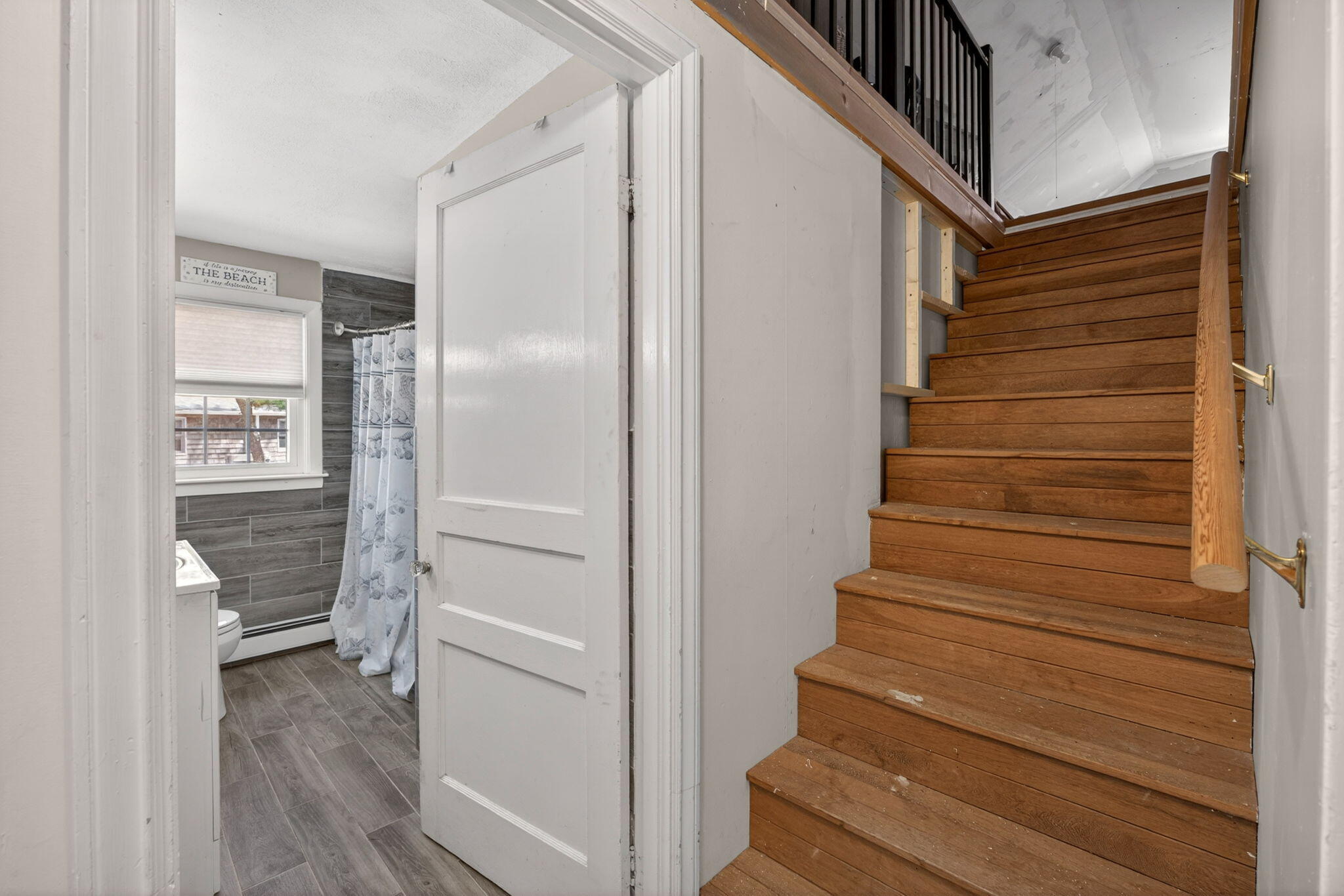 20 Fresh Brook Lane, Unit A Wellfleet, MA 02667 - Photo 24 of 35 a view of entryway and gallery with wooden floor
