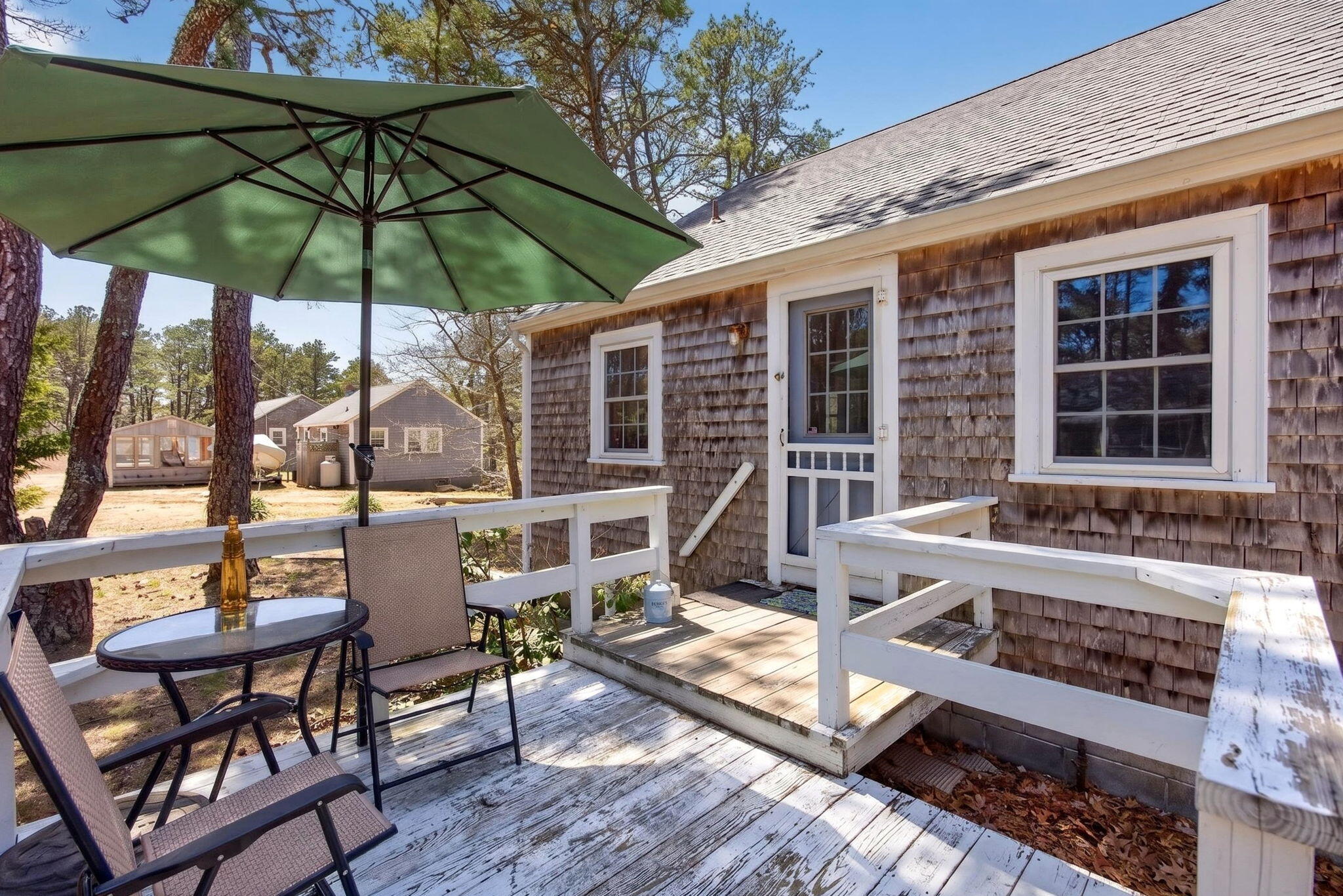 20 Fresh Brook Lane, Unit A Wellfleet, MA 02667 - Photo 29 of 35 an outdoor view of house with patio