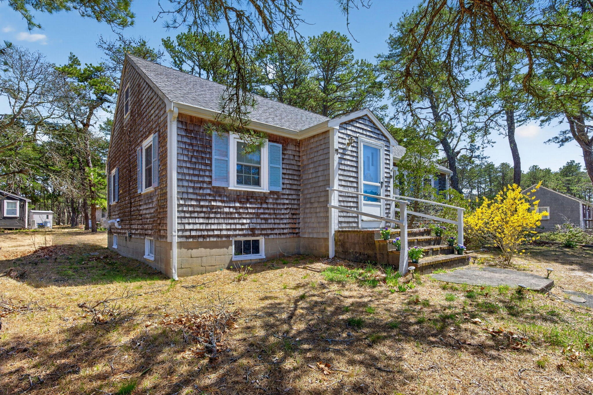 20 Fresh Brook Lane, Unit A Wellfleet, MA 02667 - Photo 30 of 35 a backyard of a house