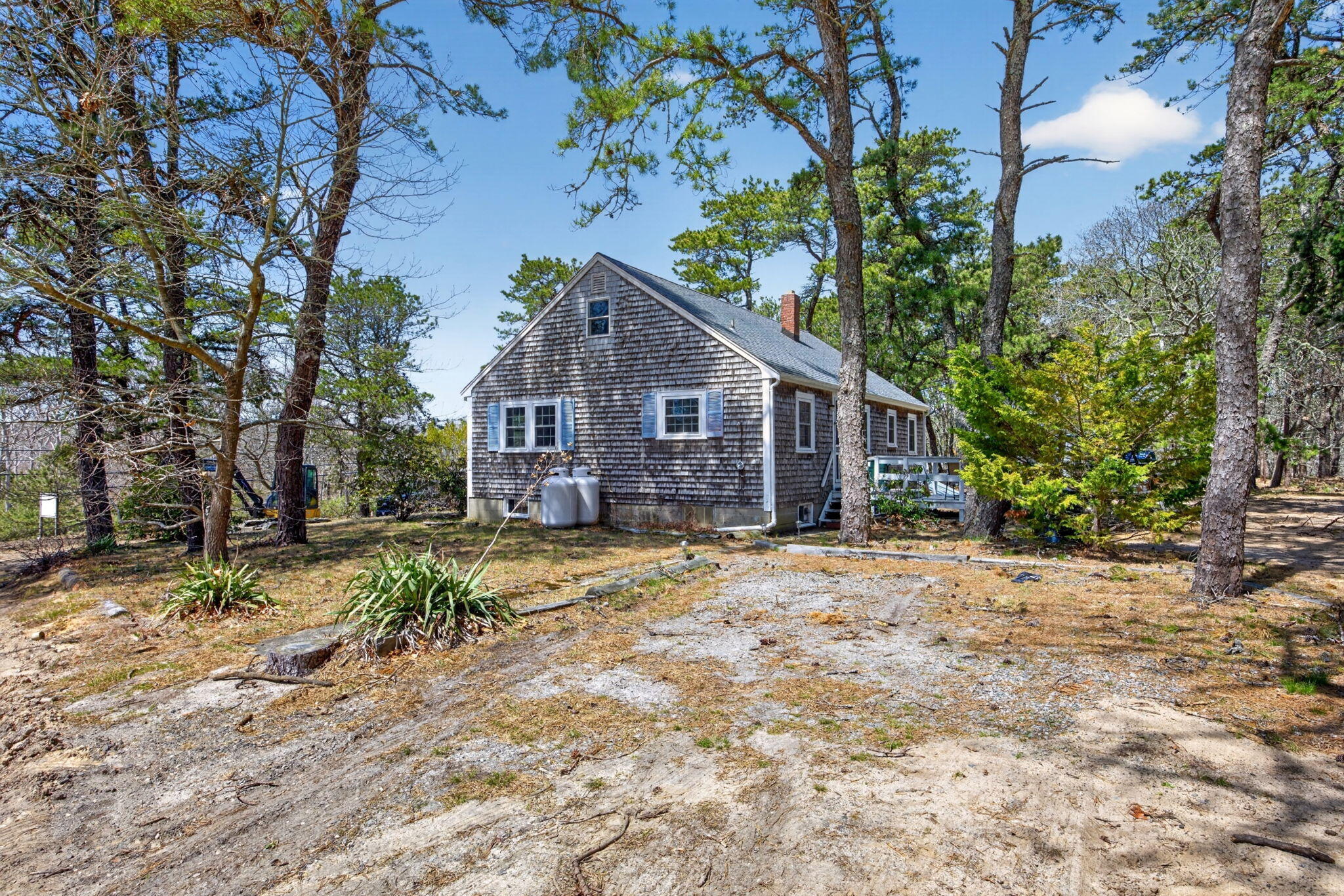 20 Fresh Brook Lane, Unit A Wellfleet, MA 02667 - Photo 33 of 35 a view of a house with a tree in the background