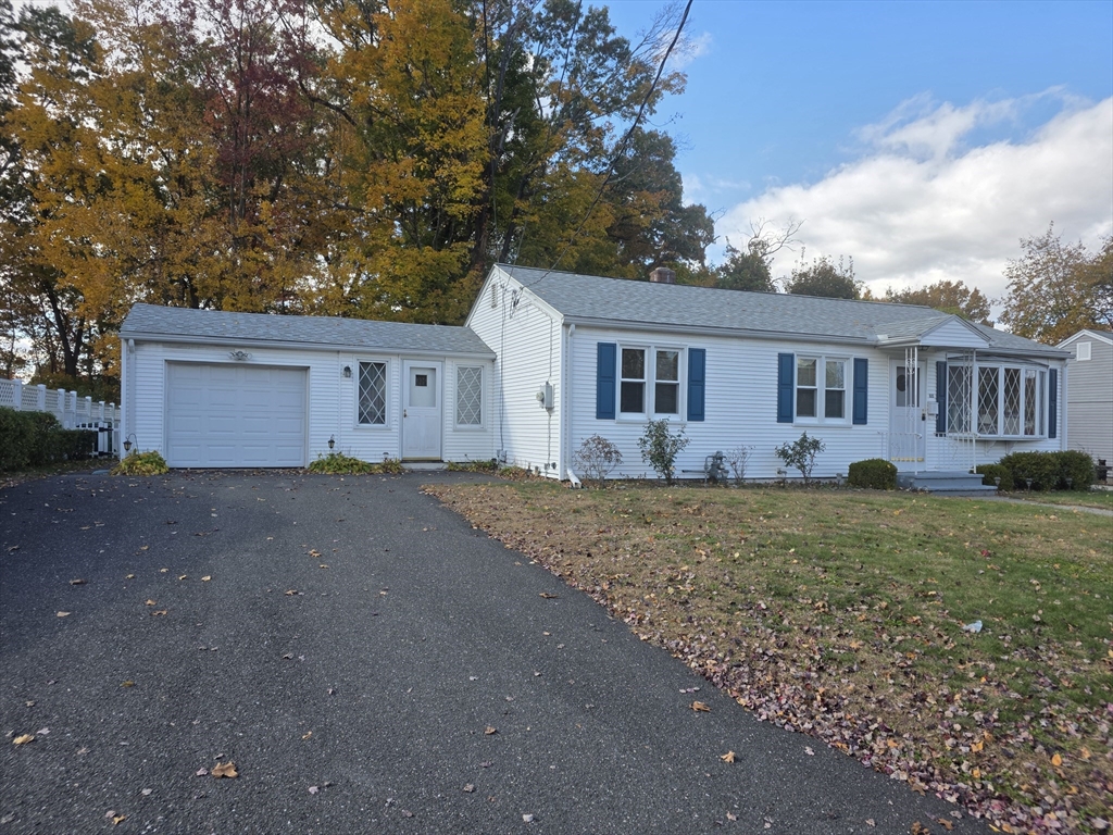 80 Ann Street Chicopee, MA 01020 - Photo 2 of 20 a view of a house with backyard and garden