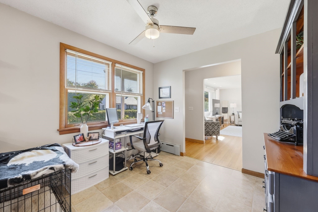 20 Connolly Street Springfield, MA 01151 - Photo 13 of 41 a view of a workspace with furniture and a window
