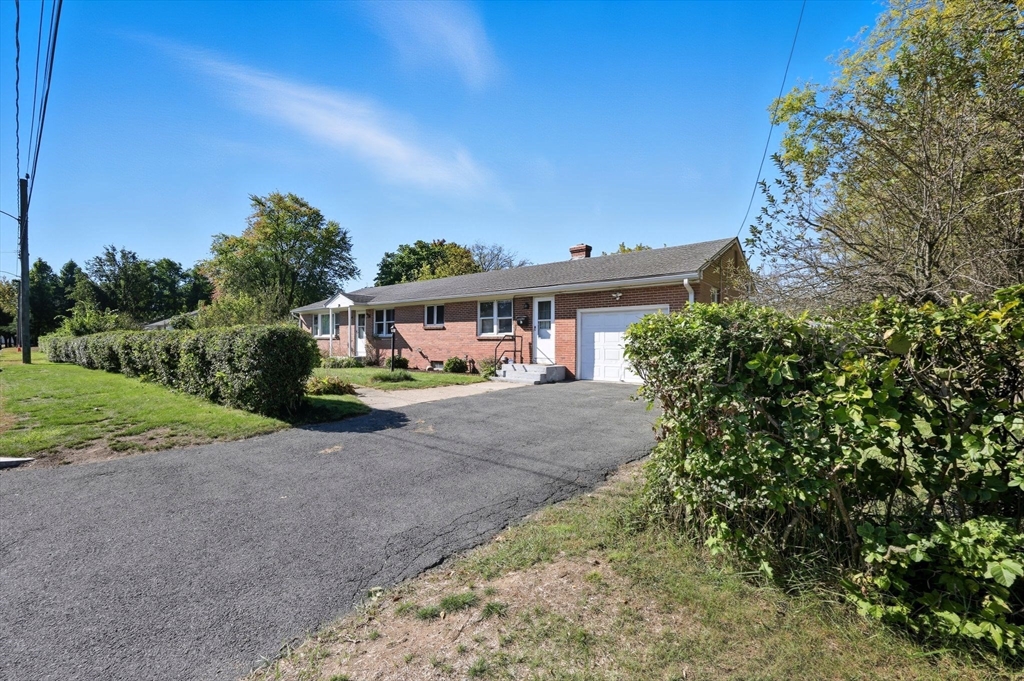 20 Connolly Street Springfield, MA 01151 - Photo 3 of 41 a view of a house with a yard