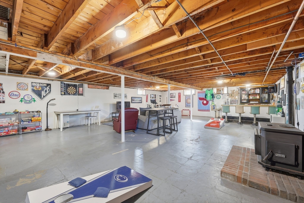 20 Connolly Street Springfield, MA 01151 - Photo 32 of 41 a view of a garage with a table and chairs