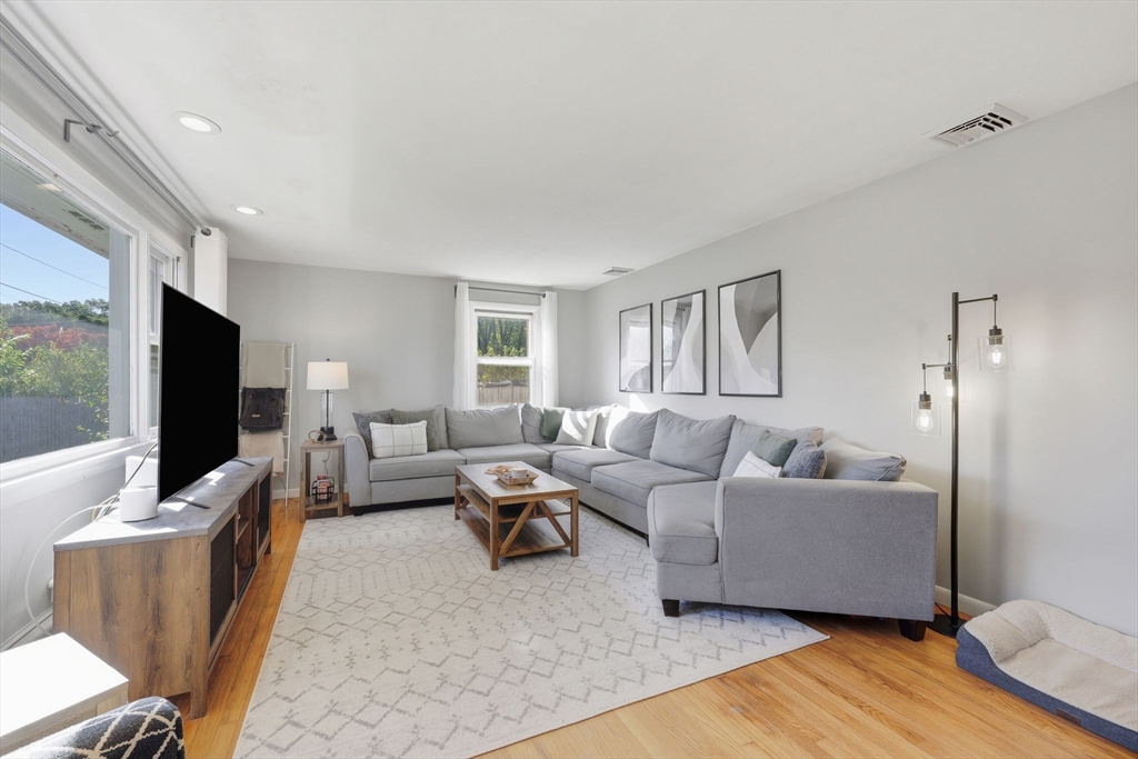 20 Connolly Street Springfield, MA 01151 - Photo 7 of 41 a living room with furniture and a flat screen tv