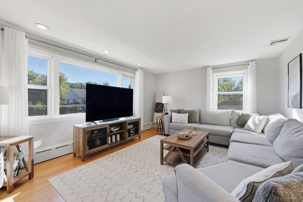 20 Connolly Street Springfield, MA 01151 - Photo 8 of 41 a living room with furniture and a flat screen tv