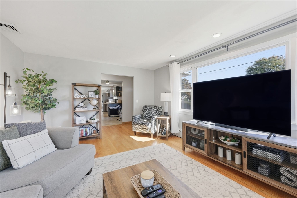 20 Connolly Street Springfield, MA 01151 - Photo 10 of 41 a living room with furniture and a flat screen tv