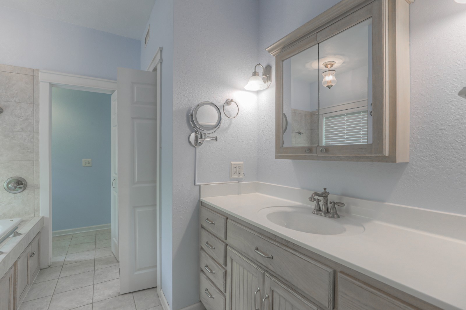 807 Timberwood Trace Monteagle, TN 37356 - Photo 24 of 64 a bathroom with a sink and a mirror