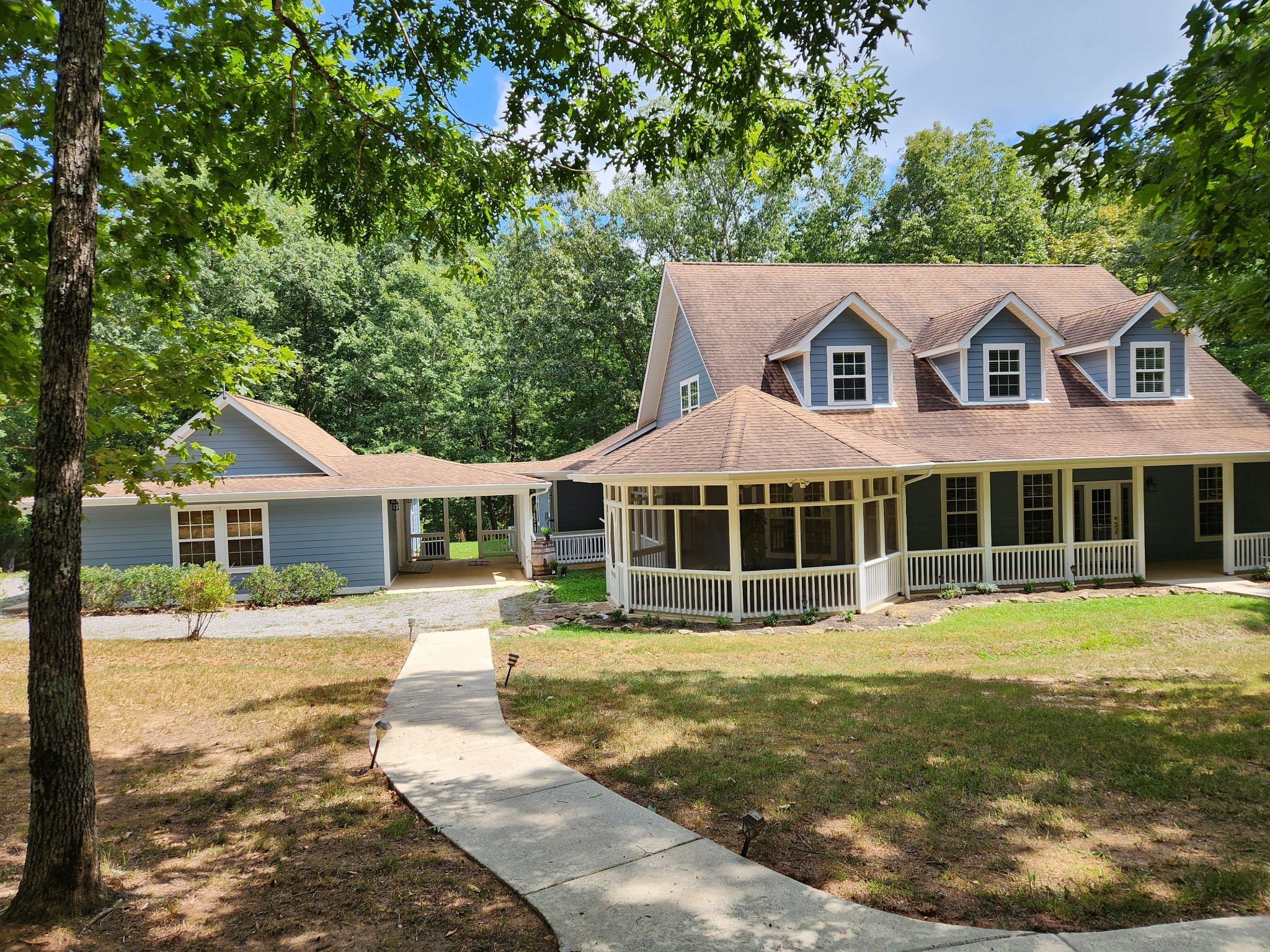 807 Timberwood Trace Monteagle, TN 37356 - Photo 55 of 64 a front view of a house with a yard