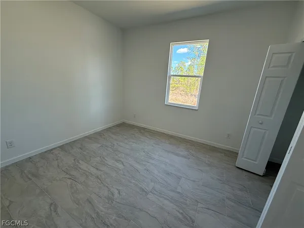 $1,950 | 1115 Cove Street East, Lehigh Acres, FL 33974
