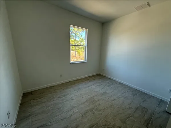 an empty room with a window