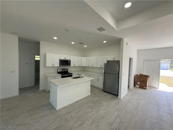$1,950 | 1115 Cove Street East, Lehigh Acres, FL 33974