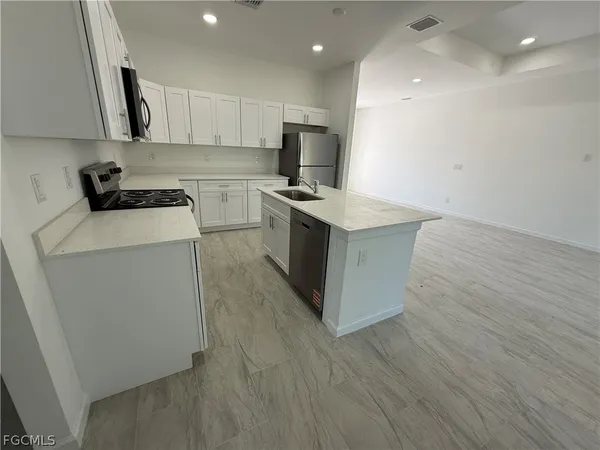 $1,950 | 1115 Cove Street East, Lehigh Acres, FL 33974