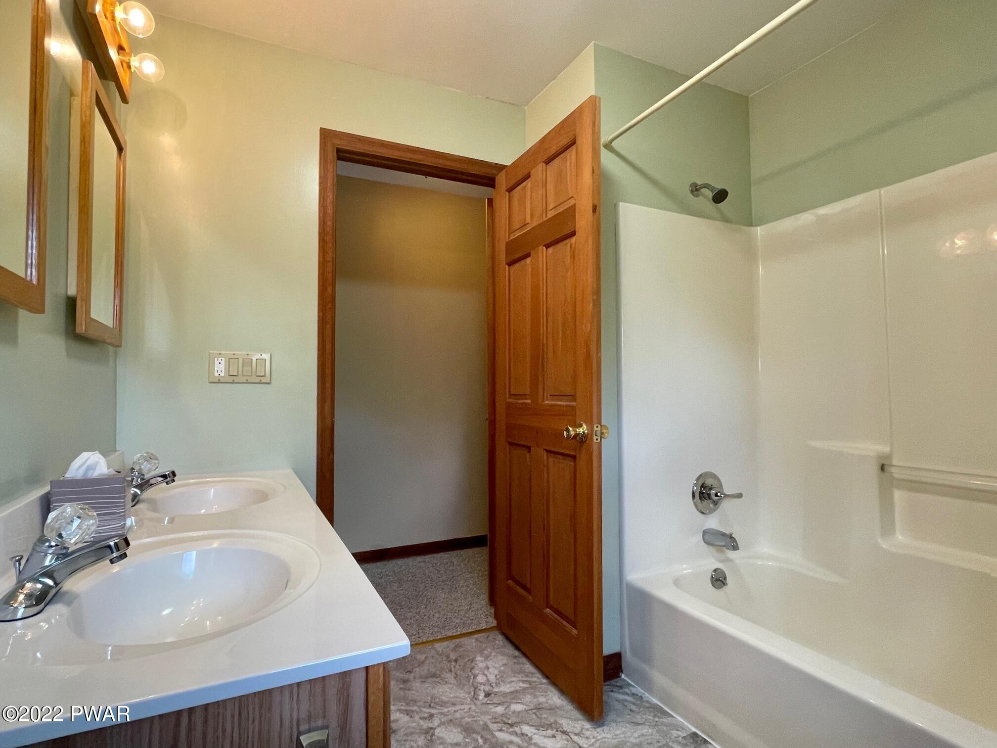 524 Creamton Drive Prompton, PA 18456 - Photo 45 of 57 a bathroom with a sink and shower