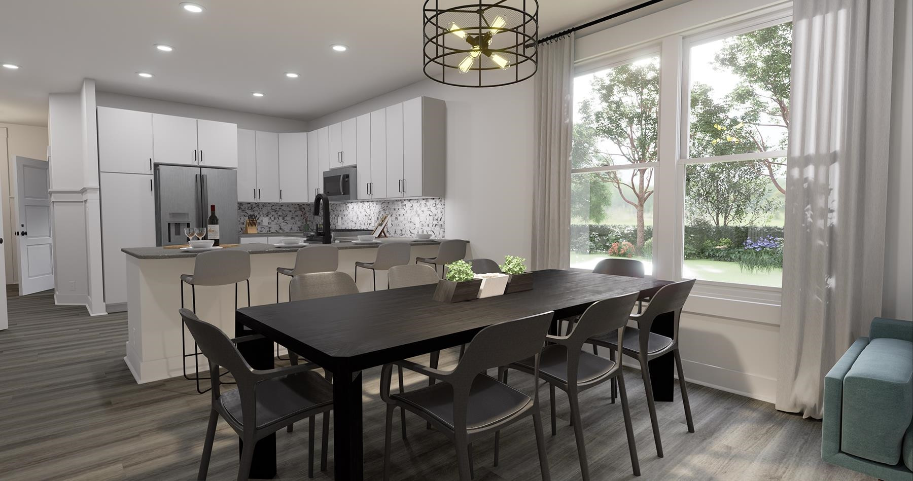 3921 Milltown Ridge Run Raleigh, NC 27612 - Photo 3 of 17 a view of a dining room with furniture a chandelier and wooden floor