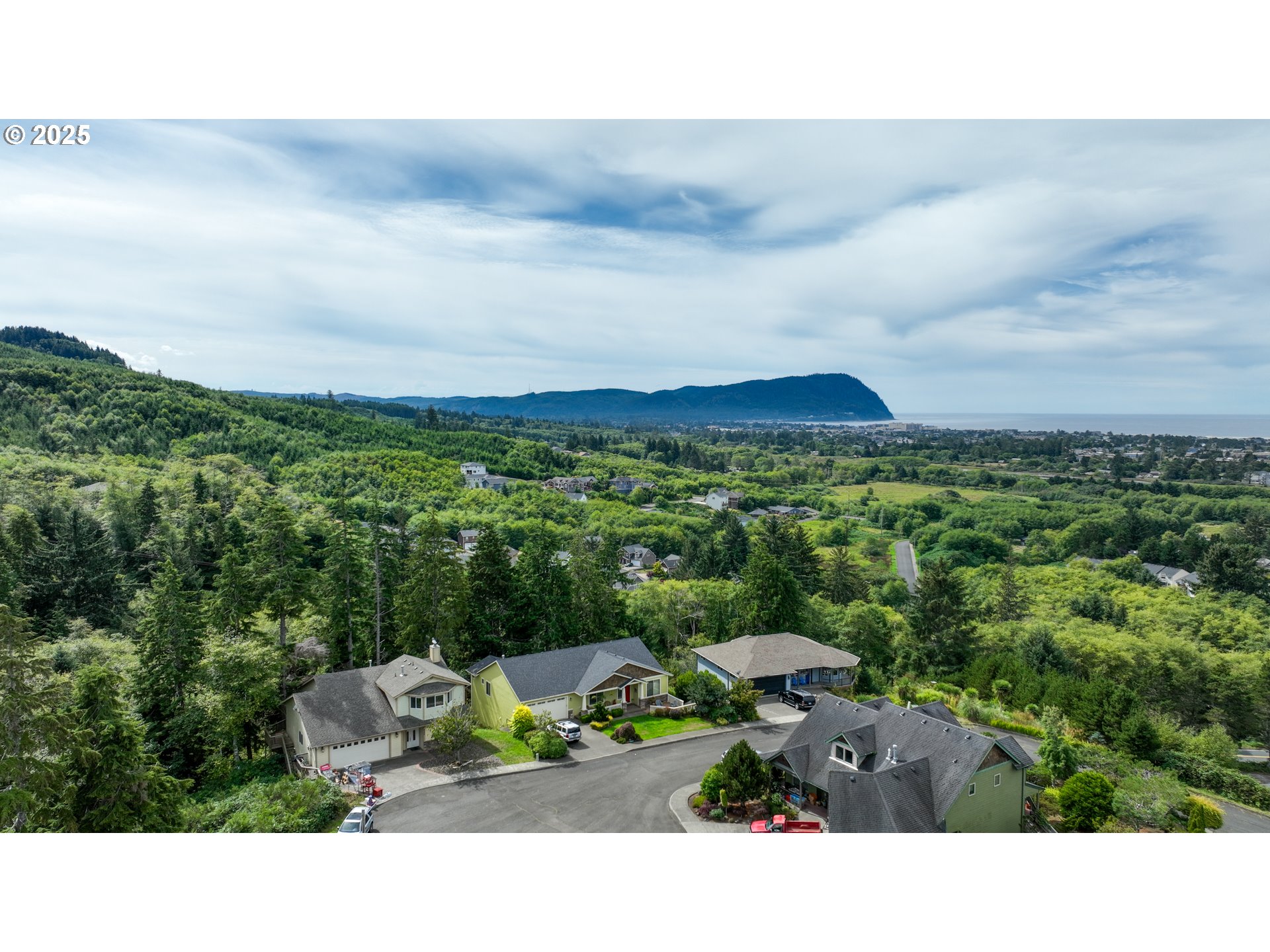 2344 Royal View Drive Seaside, OR 97138 - Photo 2 of 38 a view of a city with lush green space