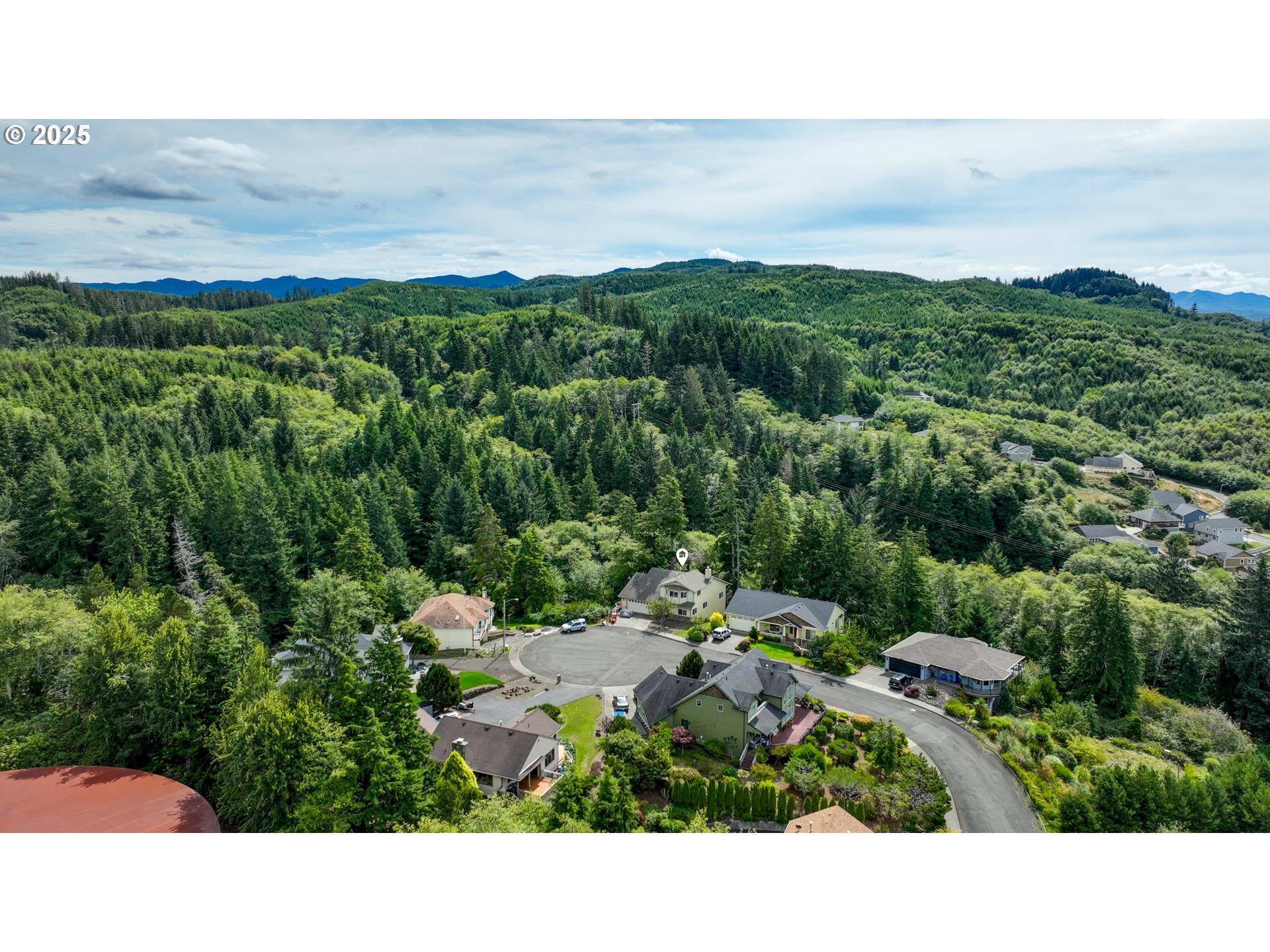 2344 Royal View Drive Seaside, OR 97138 - Photo 3 of 38 a view of a bunch of trees and a garden