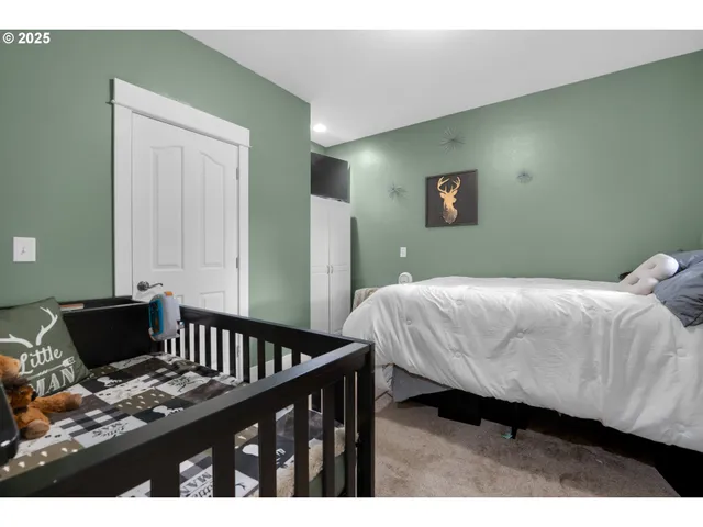 a room with furniture and a flat screen tv