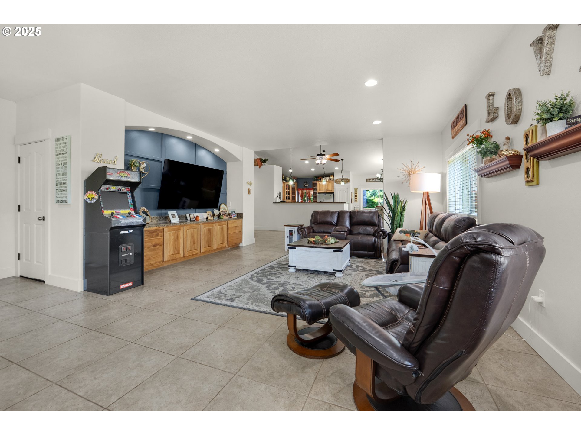 2344 Royal View Drive Seaside, OR 97138 - Photo 6 of 38 a living room with furniture and a flat screen tv
