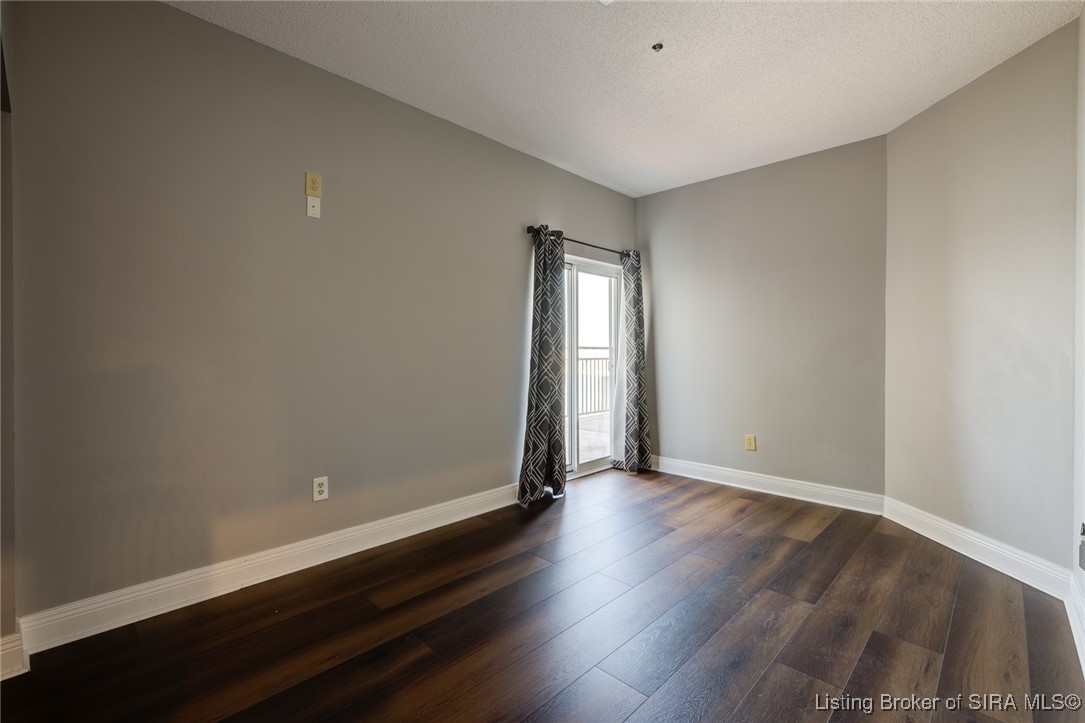 1 Riverpointe Plaza, Unit 1105 Jeffersonville, IN 47130 - Photo 20 of 44 2nd Bedroom - slider to balcony