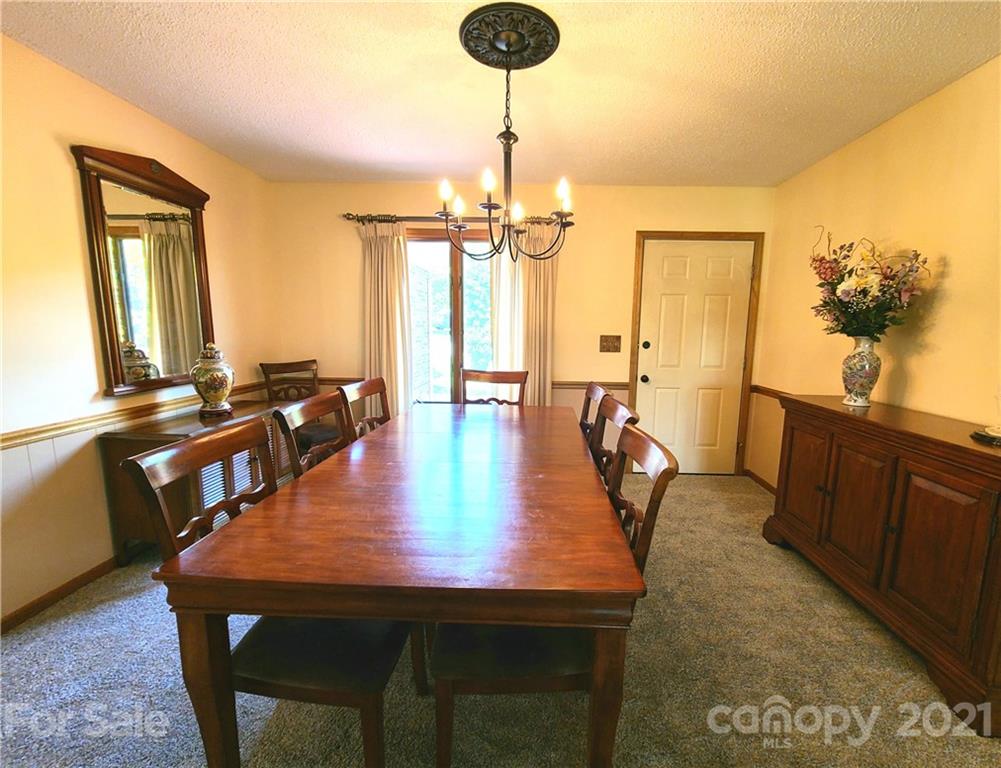250 Tanner Street Rutherfordton, NC 28139 - Photo 12 of 48 a dining room with furniture and window
