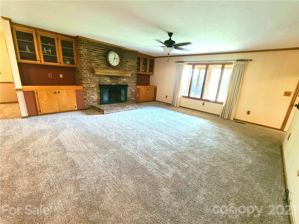 250 Tanner Street Rutherfordton, NC 28139 - Photo 13 of 48 a view of an empty room with a fireplace