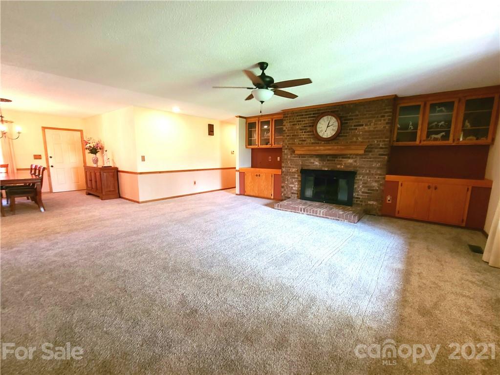 250 Tanner Street Rutherfordton, NC 28139 - Photo 14 of 48 a view of an empty room with a fireplace