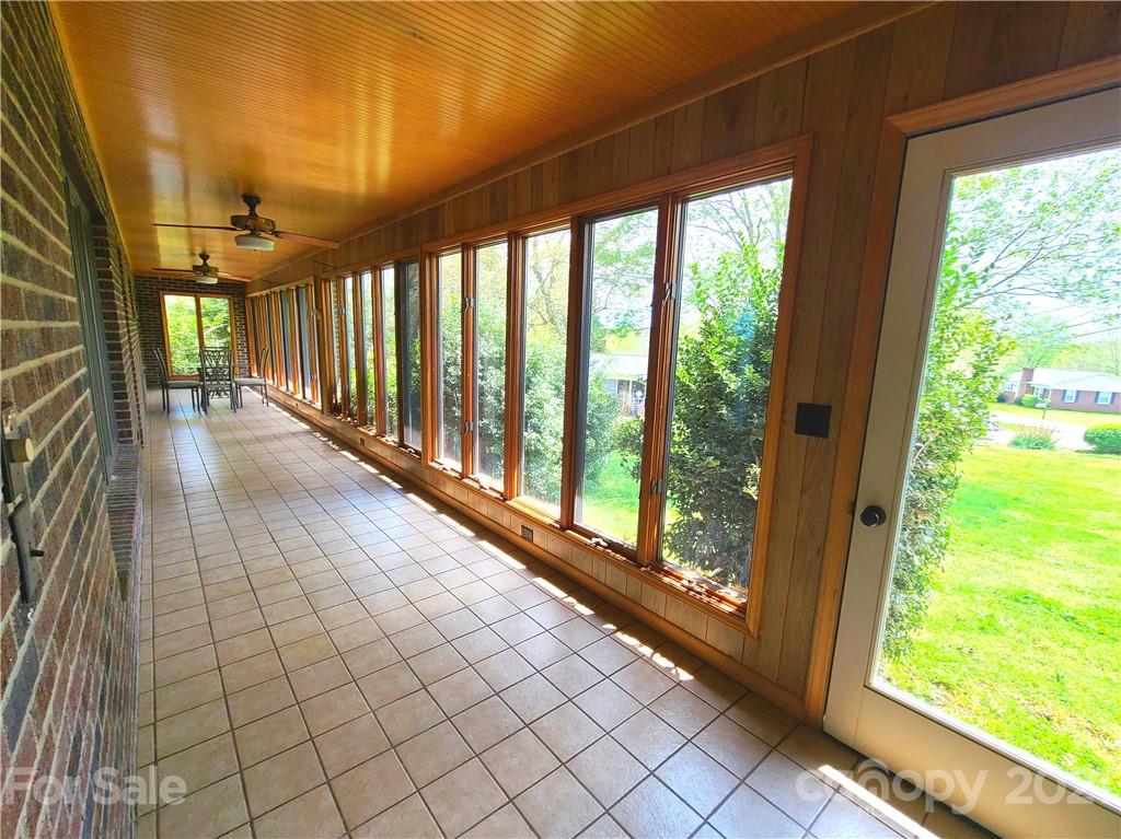 250 Tanner Street Rutherfordton, NC 28139 - Photo 15 of 48 a view of a room with wooden floor and windows