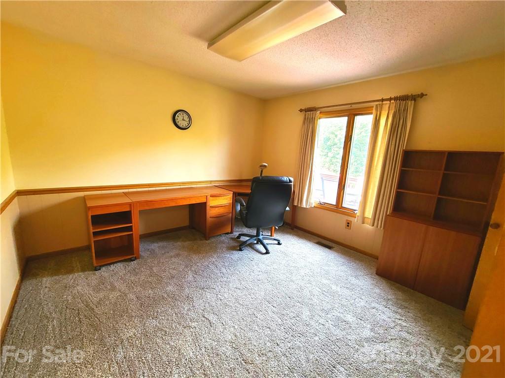 250 Tanner Street Rutherfordton, NC 28139 - Photo 17 of 48 a work room with furniture and windows