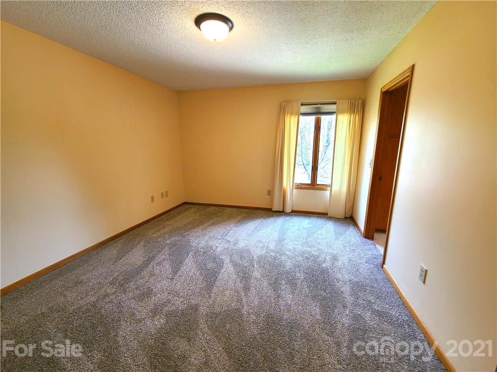 250 Tanner Street Rutherfordton, NC 28139 - Photo 21 of 48 an empty room with windows