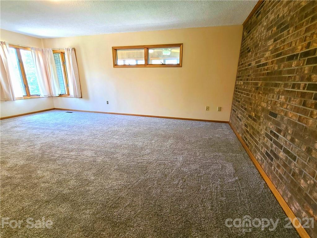 250 Tanner Street Rutherfordton, NC 28139 - Photo 27 of 48 a view of an empty room and window