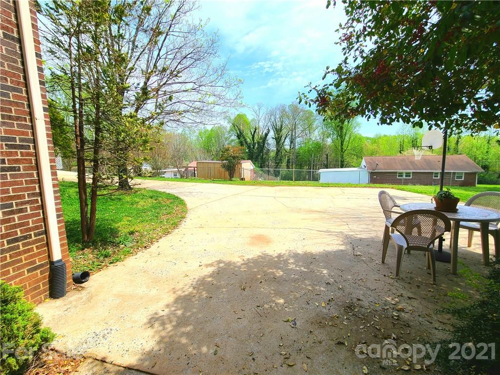 250 Tanner Street Rutherfordton, NC 28139 - Photo 39 of 48 a view of a backyard with sitting area