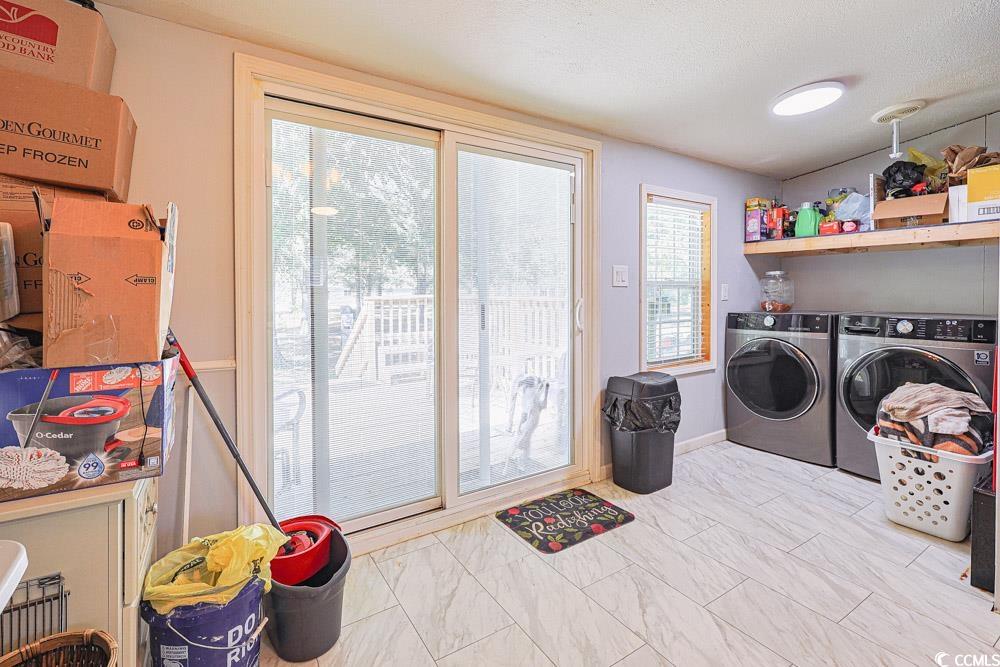1911 Abba Court Conway, SC 29526 - Photo 16 of 25 Half bathroom featuring vanity and dark tile patterned flooring