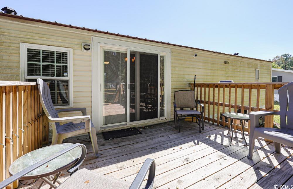 1911 Abba Court Conway, SC 29526 - Photo 25 of 25 Wooden terrace with a lawn