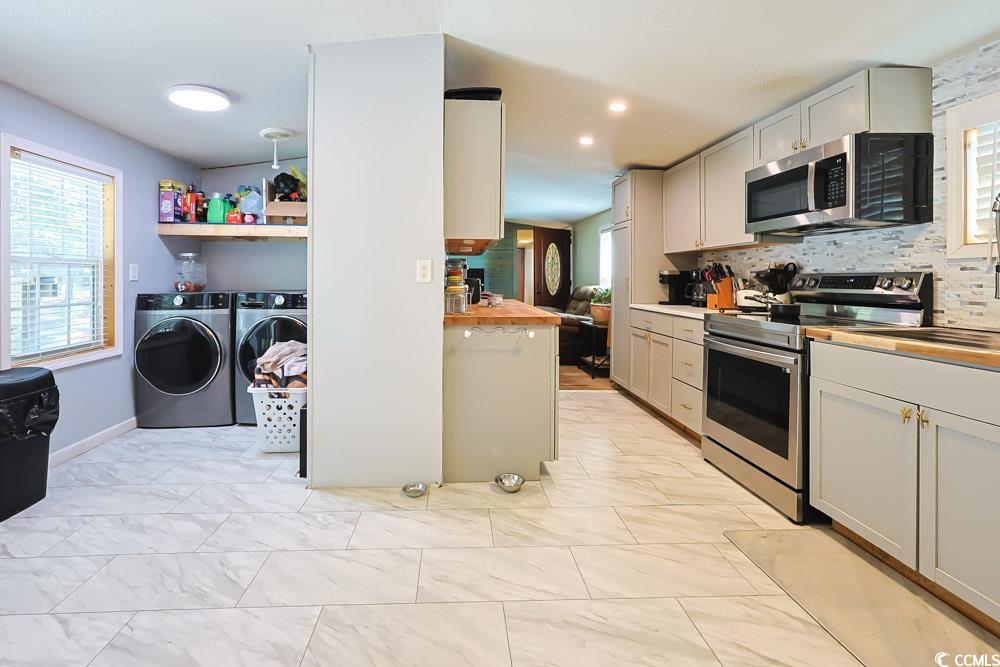 1911 Abba Court Conway, SC 29526 - Photo 9 of 25 Laundry room with independent washer and dryer