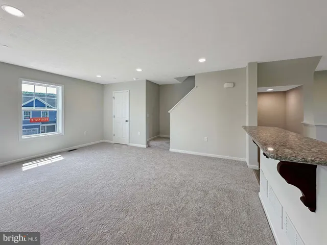 a view of a livingroom with a staircase