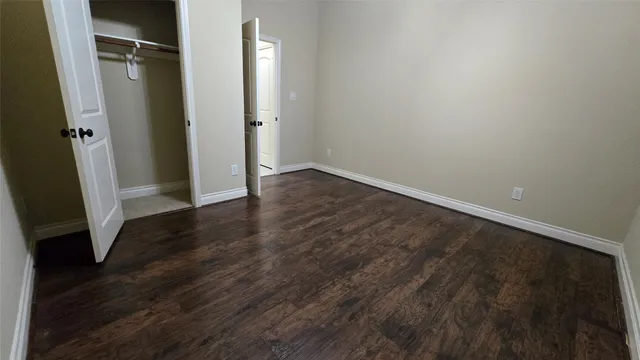 a bathroom with a bathtub and a toilet