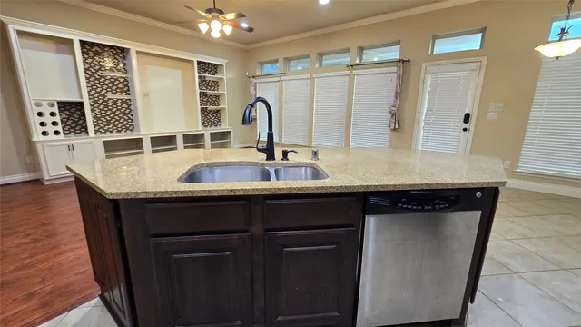 a view of kitchen with furniture and wooden floor