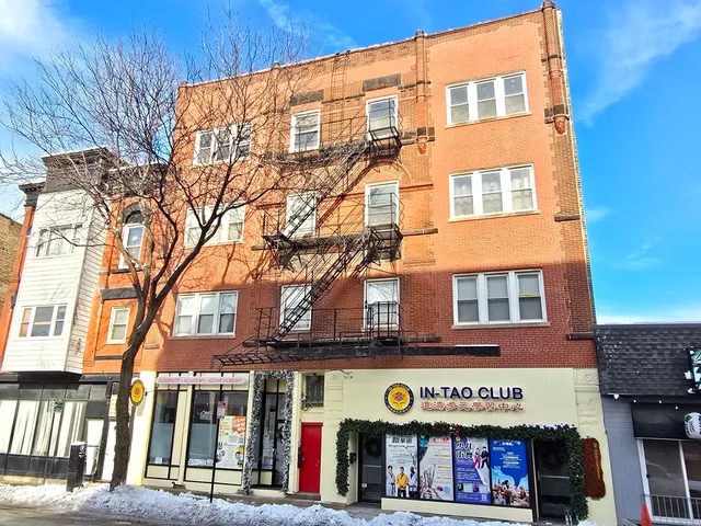 a view of a food market with retail shops